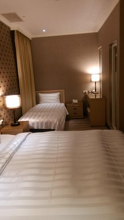 A Casa Hotel Taoyuan Room photo