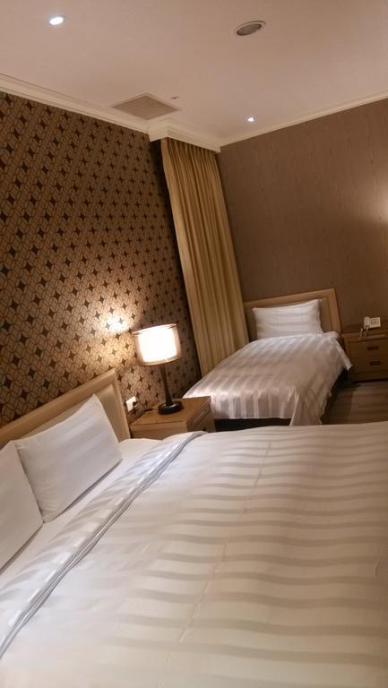 A Casa Hotel Taoyuan Room photo